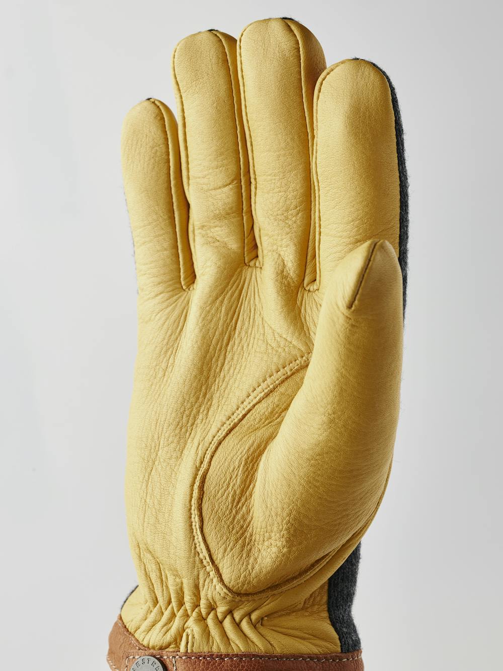 Yellow machine-sewn deerskin glove with dark gray wool jersey back
(4 of 6)