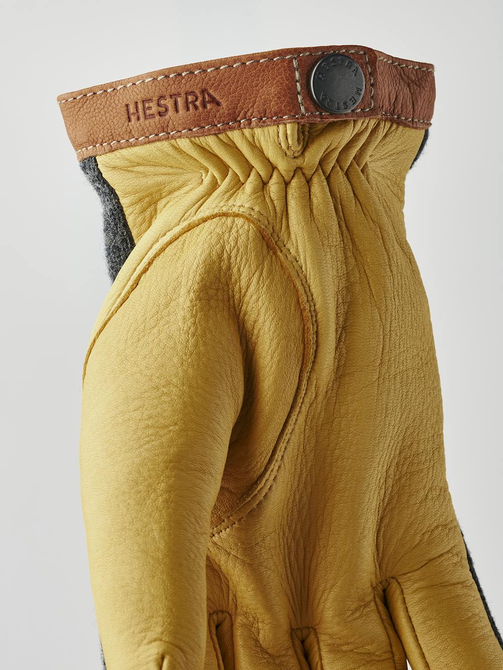 Yellow machine-sewn deerskin glove with dark gray wool jersey back
(3 of 6)