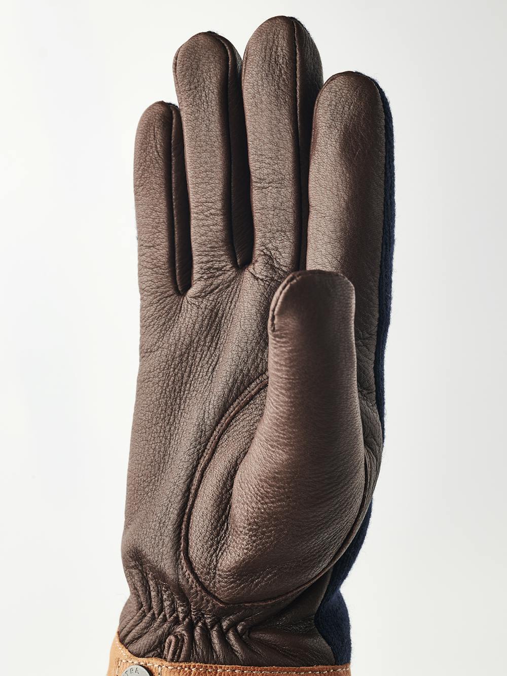 Brown machine-sewn deerskin glove with dark blue wool jersey back
 (4 of 6)