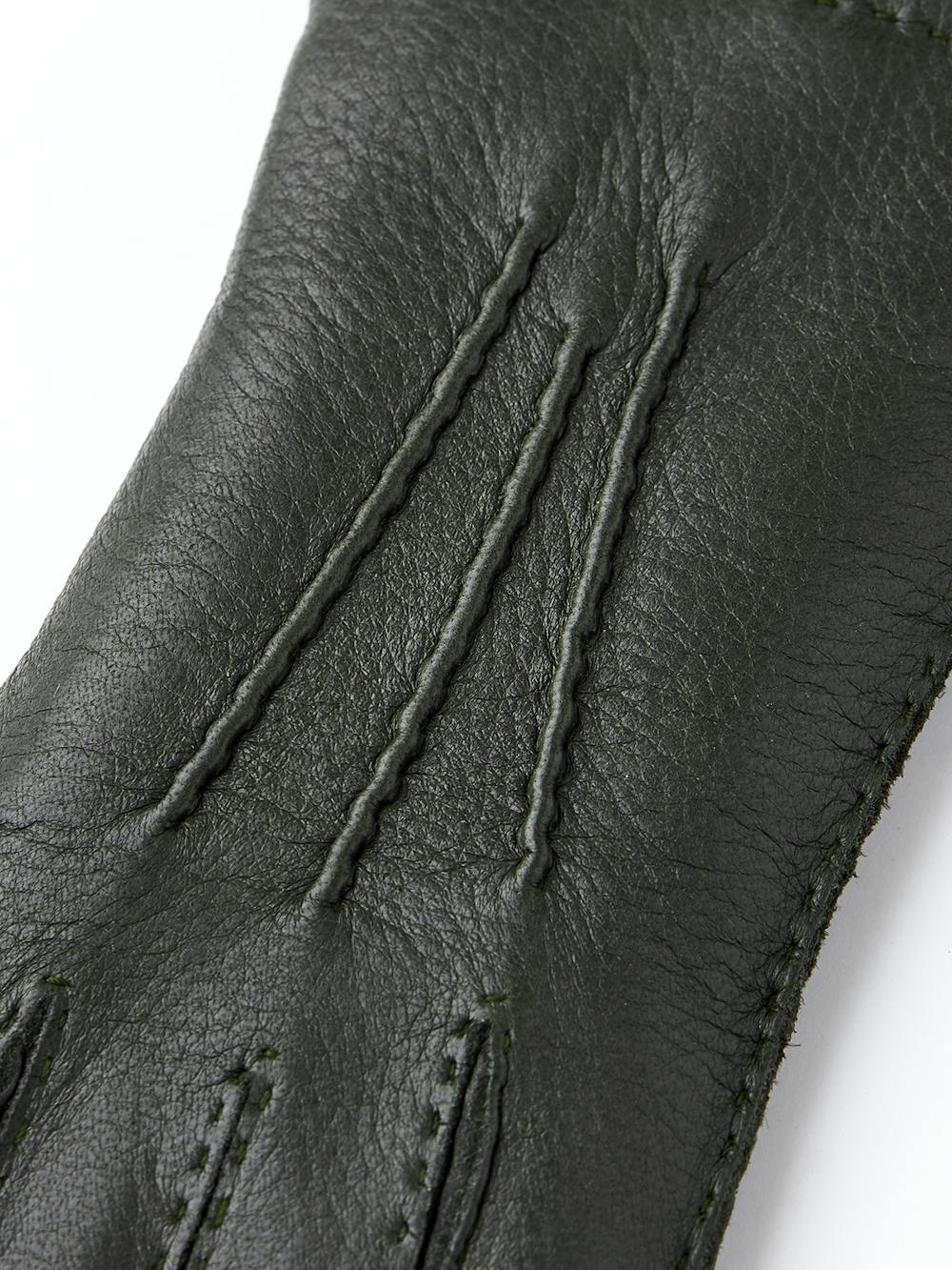 Mörkgrön handsydd handske i älgskinn
 (2 av 4)