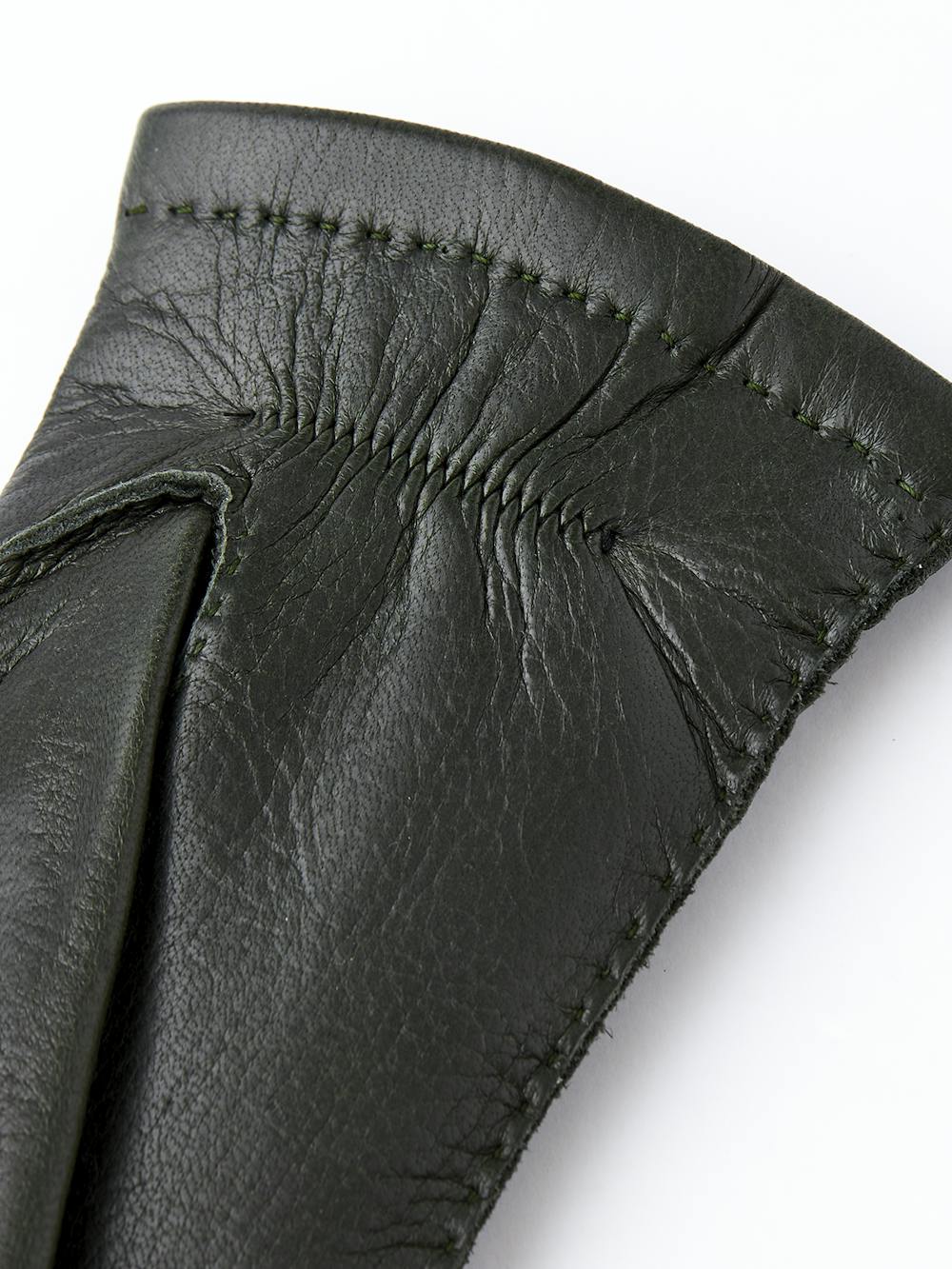 Mörkgrön handsydd handske i älgskinn
(3 av 4)