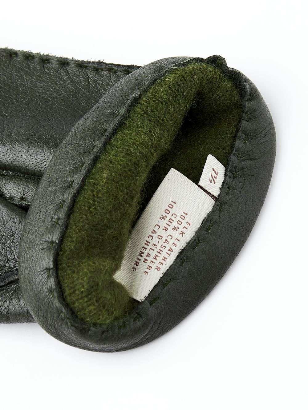 Mörkgrön handsydd handske i älgskinn
(4 av 4)