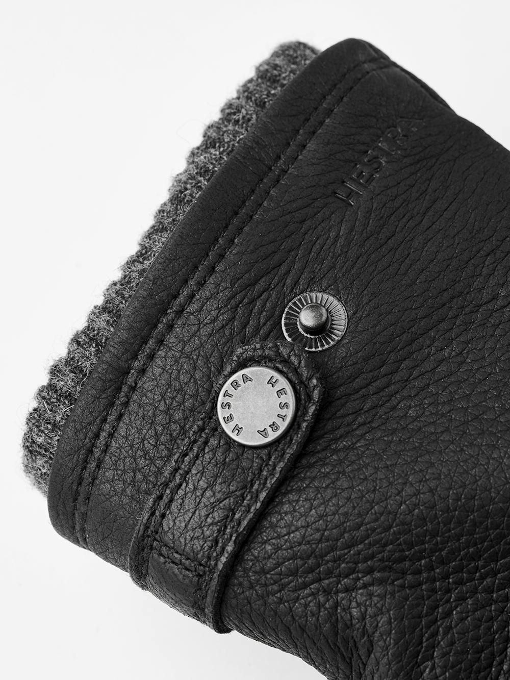 Black machine-sewn elk leather glove with leather strap and button
 (2 of 3)