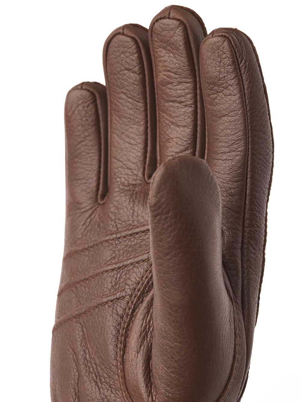 Brauner maschinengenähter Handschuh aus Elchleder mit Lederriegel und Knopf
 (4 oder 5)