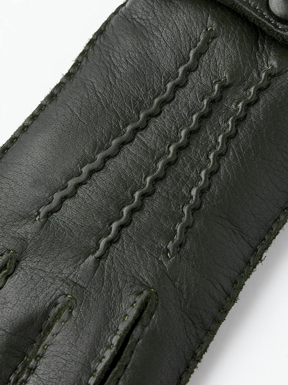 Dark green hand-sewn elk leather glove with leather strap and button
 (2 of 5)