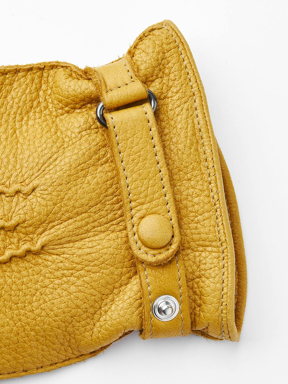 Yellow hand-sewn elk leather glove with leather strap and button
(3 of 5)