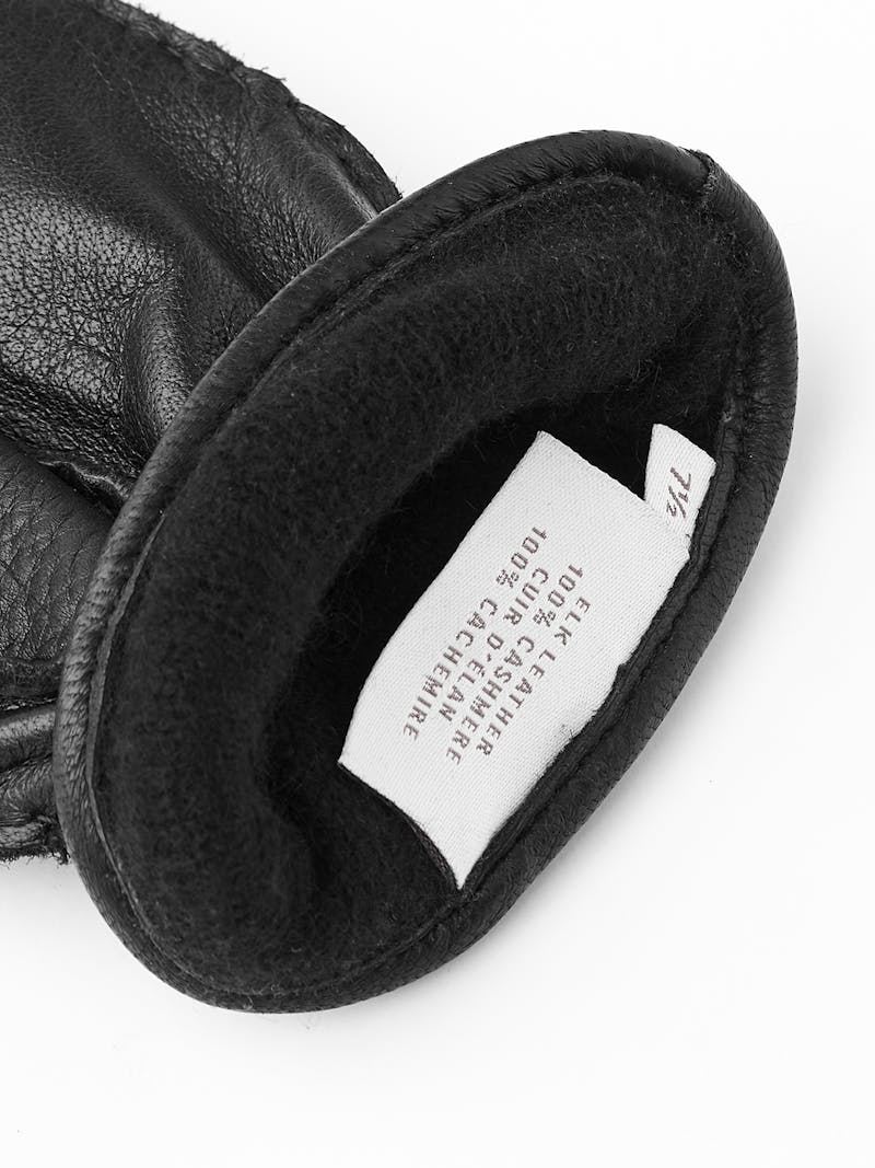 Black hand-sewn elk leather glove with leather strap and button
 (5 of 5)