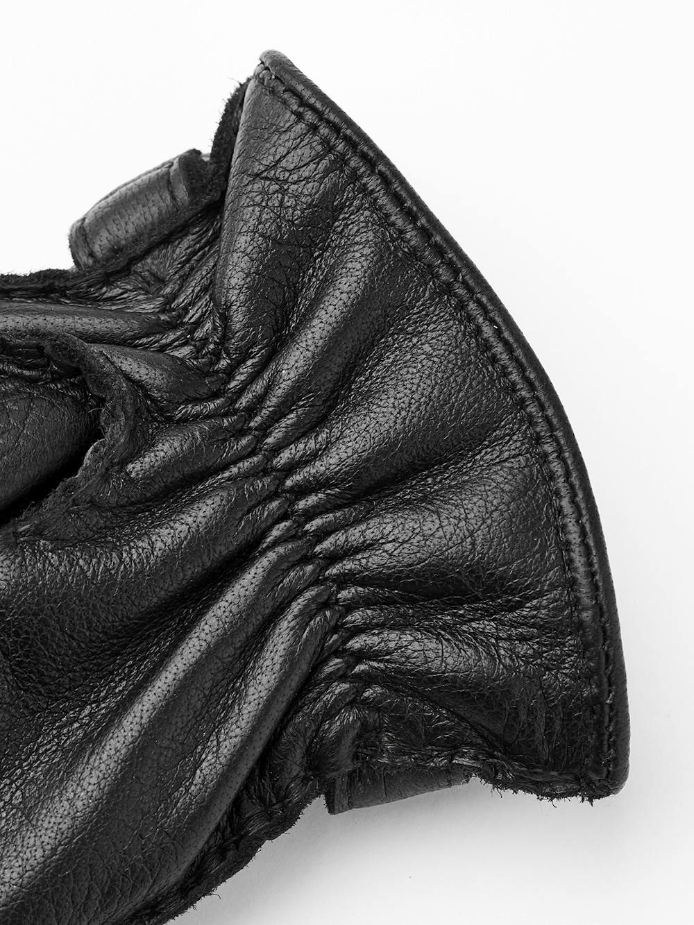 Black hand-sewn elk leather glove with leather strap and button
 (4 of 5)