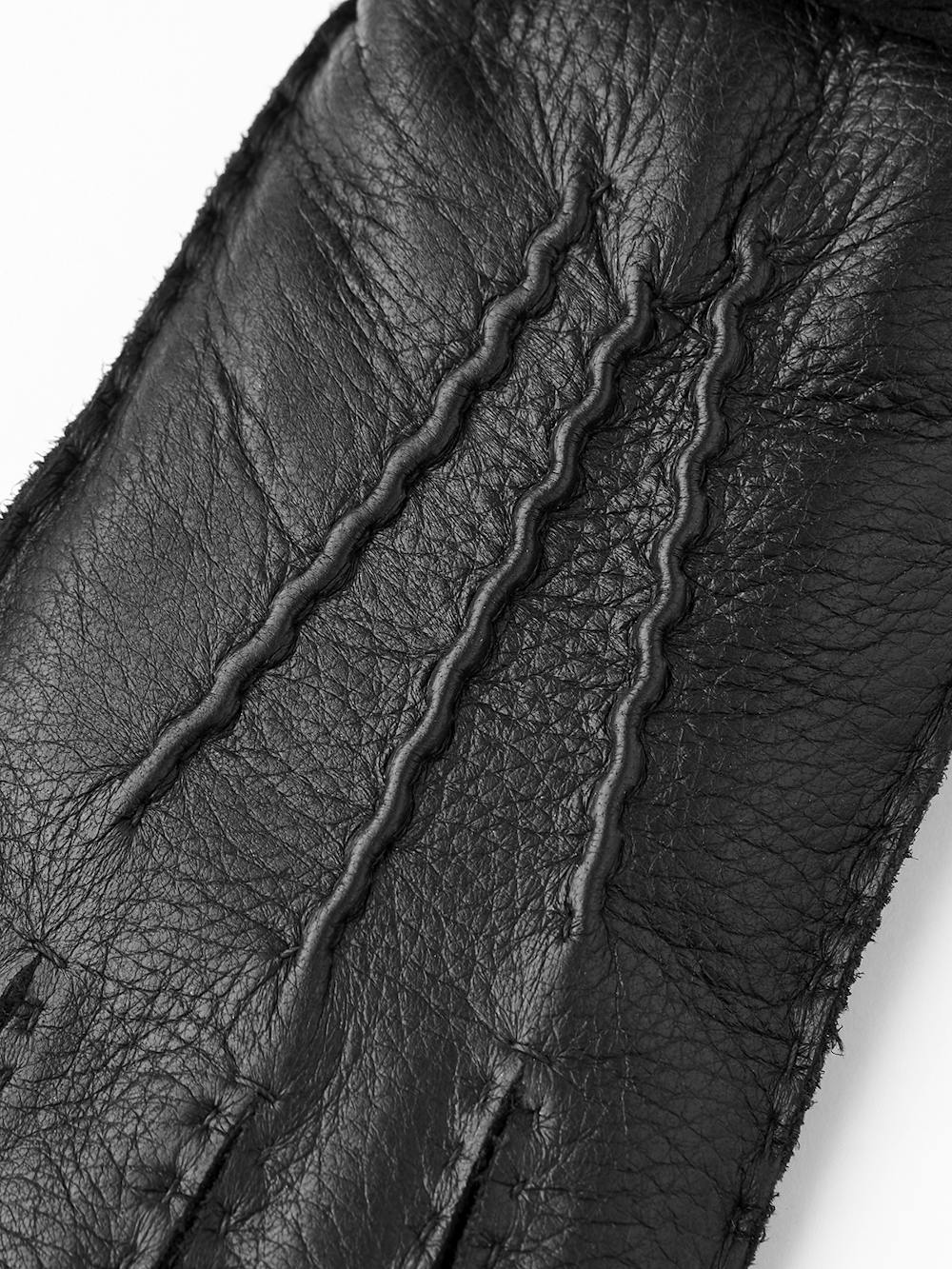 Black hand-sewn elk leather glove with leather strap and button
(2 of 5)