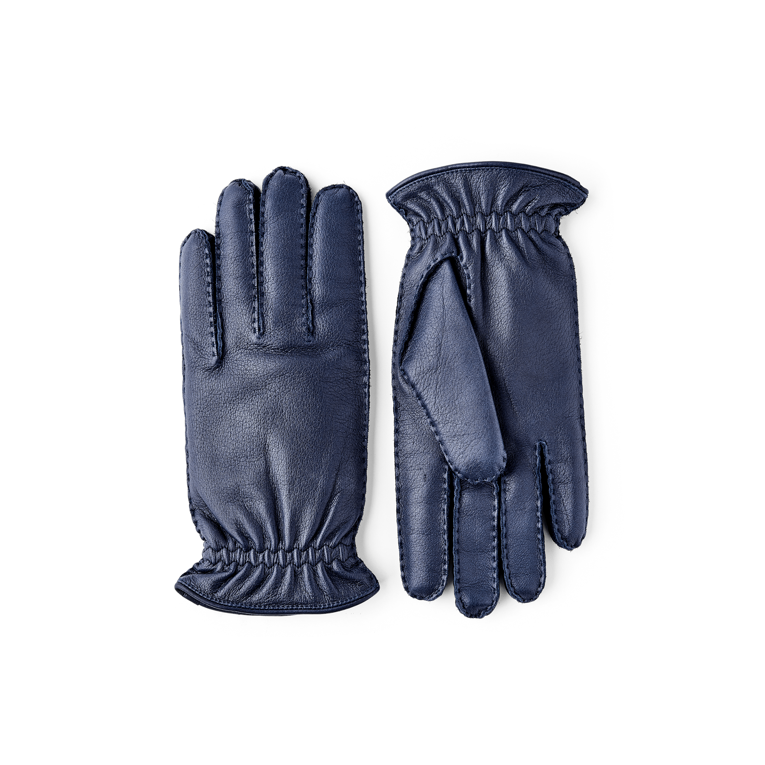 Mörkblå handsydd handske i älgskinn
 (1 av 3)