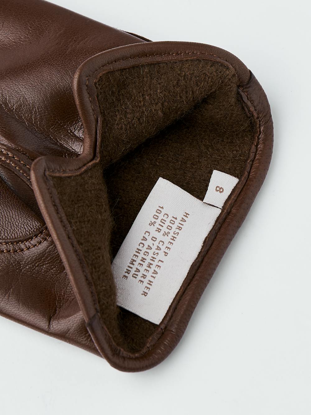 Brun maskinsydd skinnhandske i lammnappa
 (3 av 3)