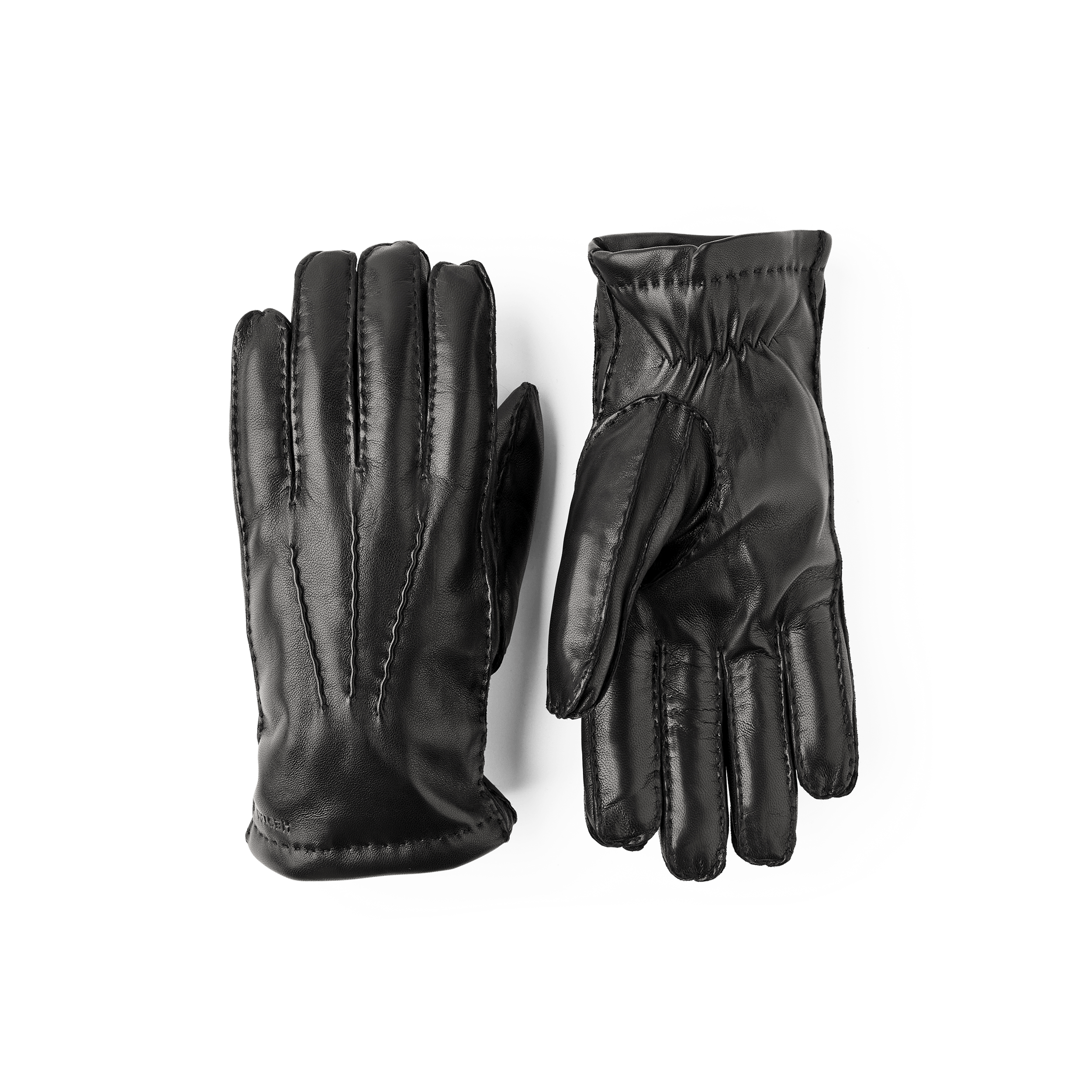 Svart handsydd skinnhandske i lammnappa
 (1 av 7)