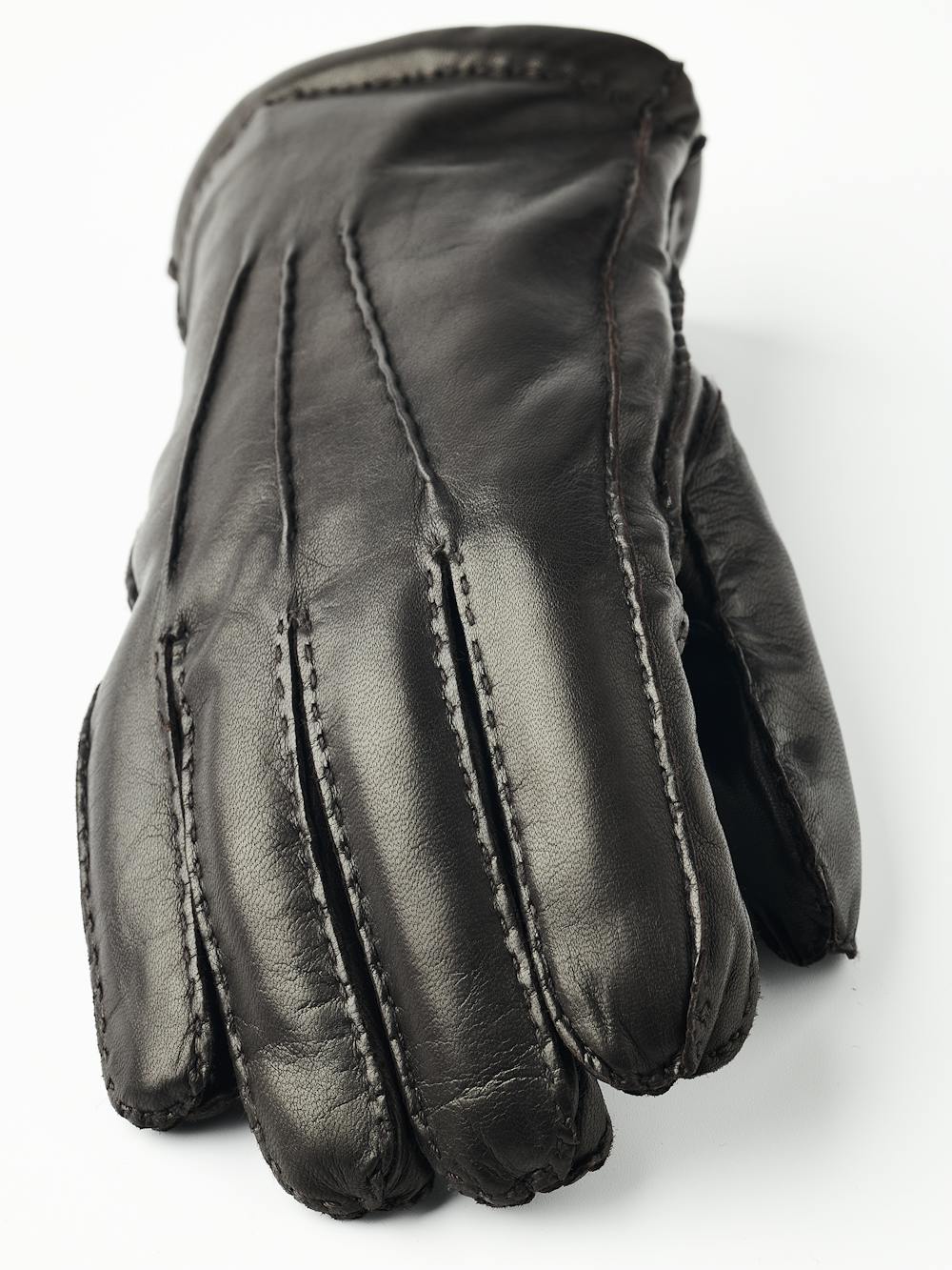 Mörkbrun handsydd skinnhandske i lammnappa
(4 av 7)