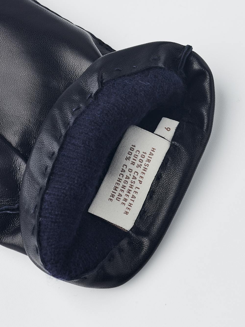 Dark blue hand-sewn hairsheep leather glove
(2 of 3)