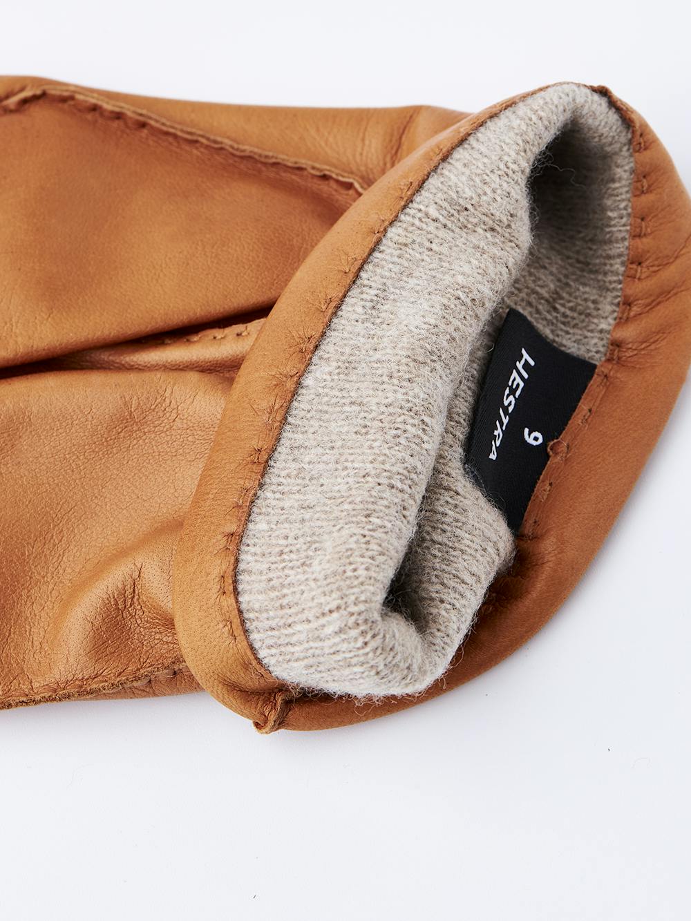 Goldbrauner handgenähter Lederhandschuh aus Haarschafleder
 (5 oder 5)