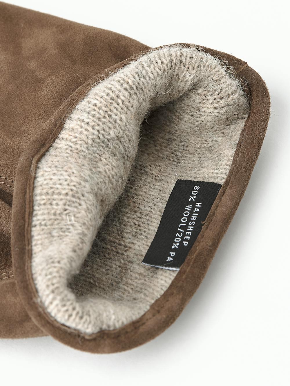 Light brown machine-sewn suede glove with leather strap and button
(3 of 4)