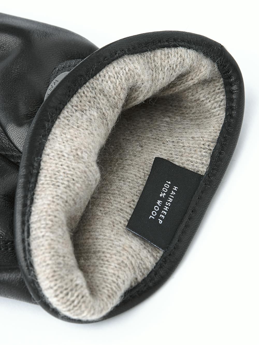 Black machine-sewn hairsheep leather glove with leather strap and button
(4 of 4)