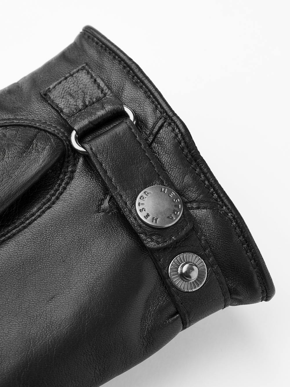 Black machine-sewn hairsheep leather glove with leather strap and button
 (3 of 4)