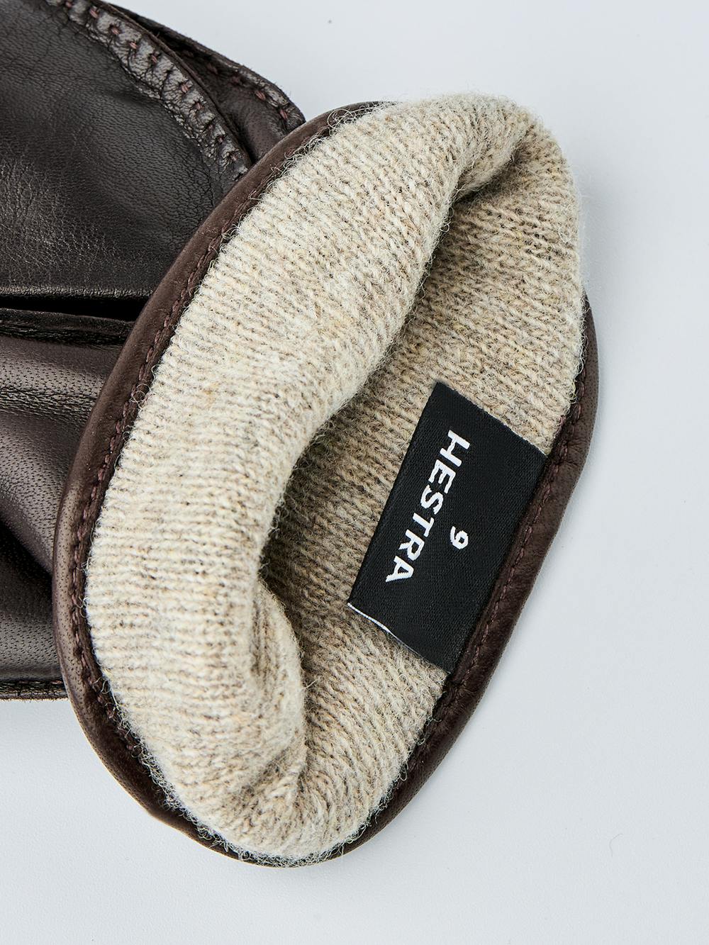 Dark brown hand-sewn hairsheep leather glove with leather strap and button
 (4 of 4)