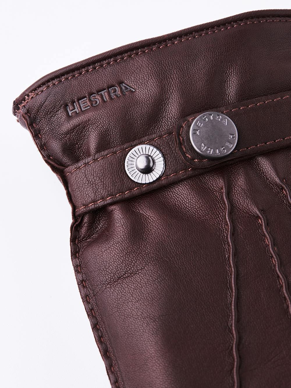 Brown hand-sewn hairsheep leather glove with leather strap and button
 (2 of 3)