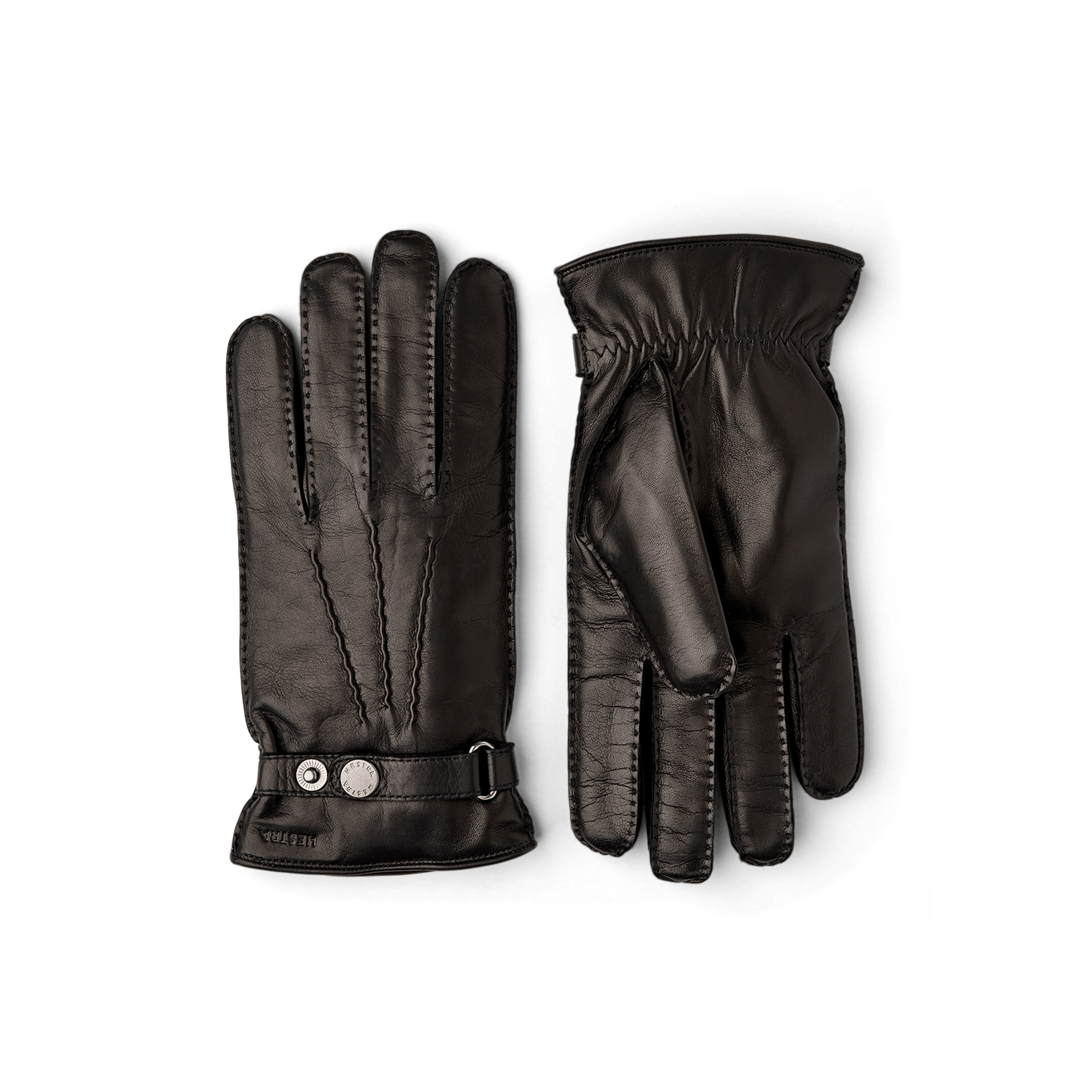 Black hand-sewn hairsheep leather glove with leather strap and button
(1 of 4)