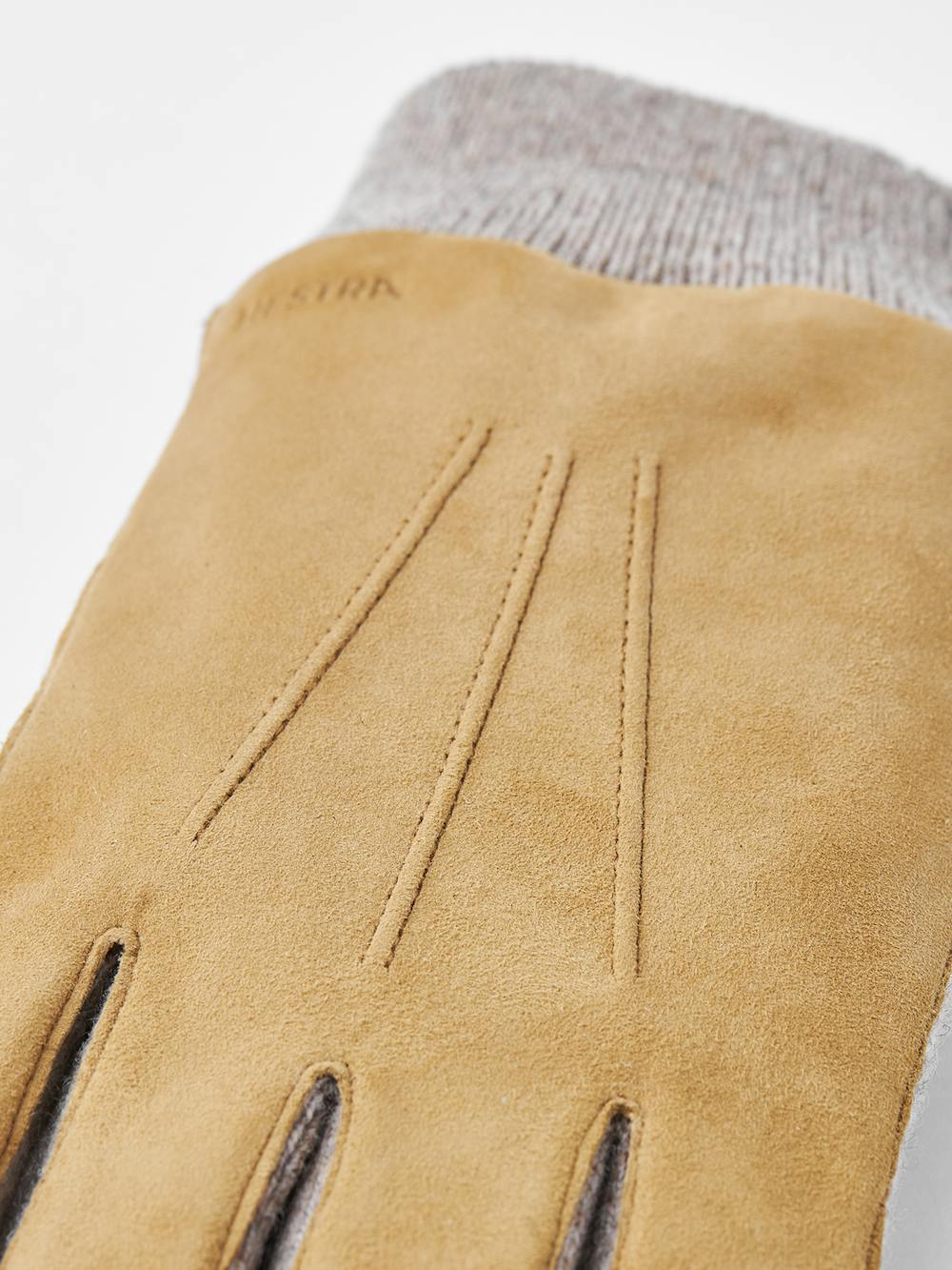 Dark beige machine-sewn suede glove with beige knitted cuff and sides
 (5 of 7)
