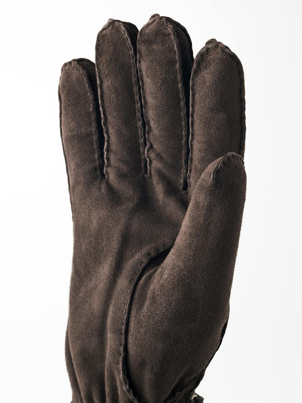Dark brown hand-sewn suede glove with leather strap and button
 (3 of 5)