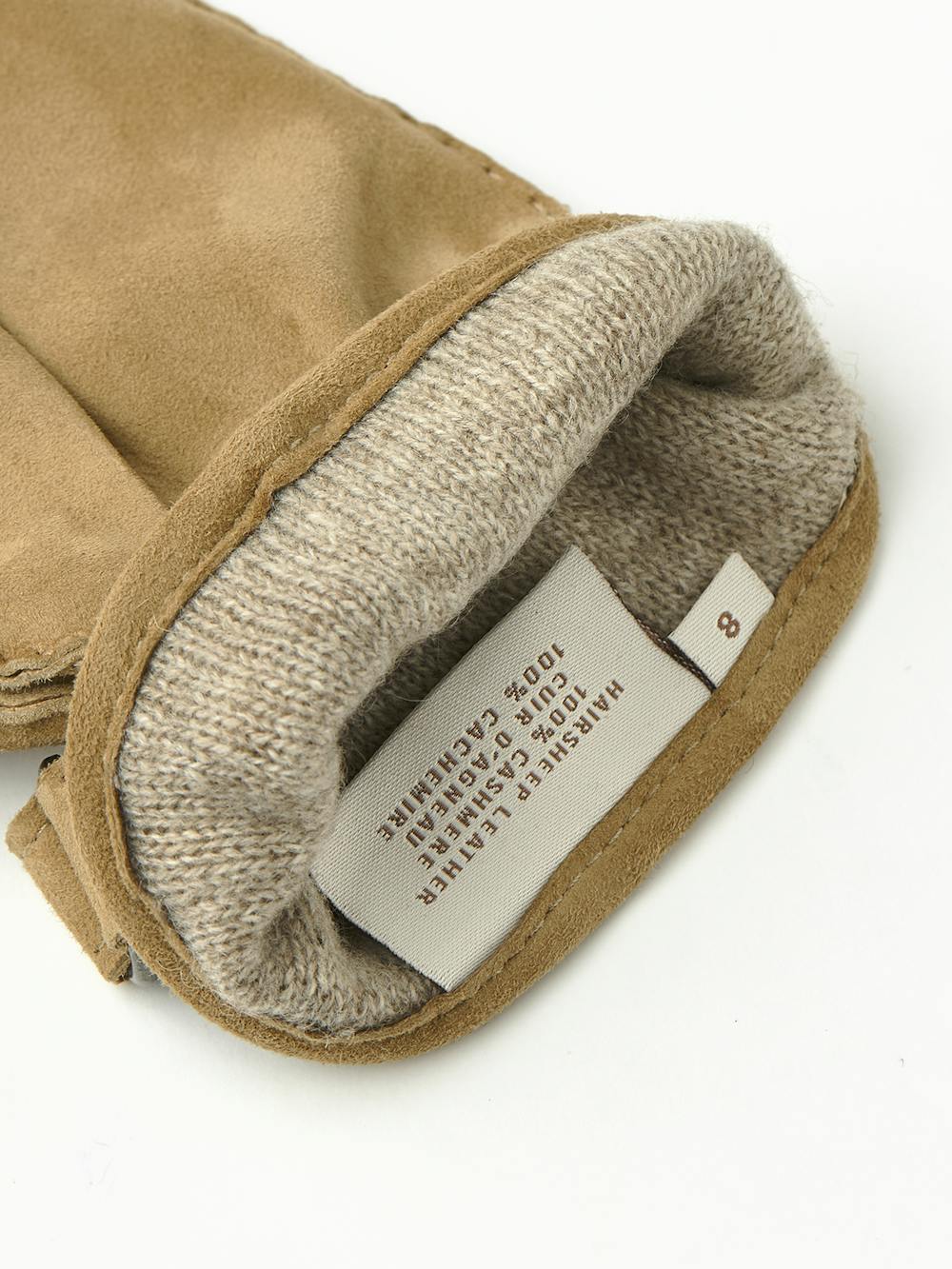 Dark beige hand-sewn suede glove with leather strap and button
(2 of 4)