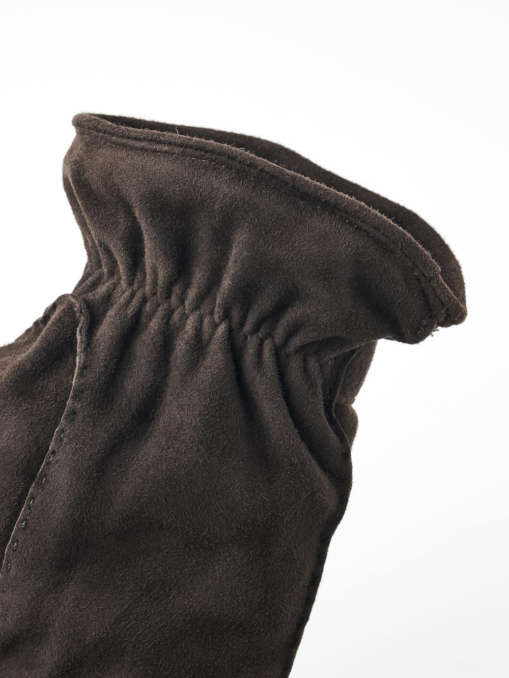 Dark brown hand-sewn suede glove with leather strap and button
 (5 of 5)