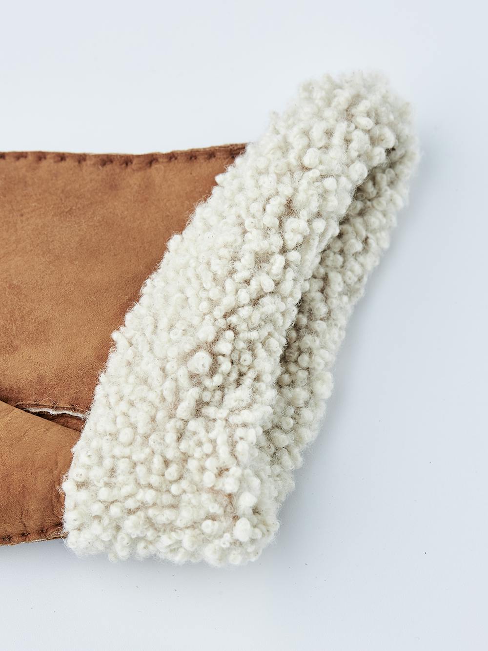 Light brownish-yellow hand-sewn fur suede glove
 (2 of 4)