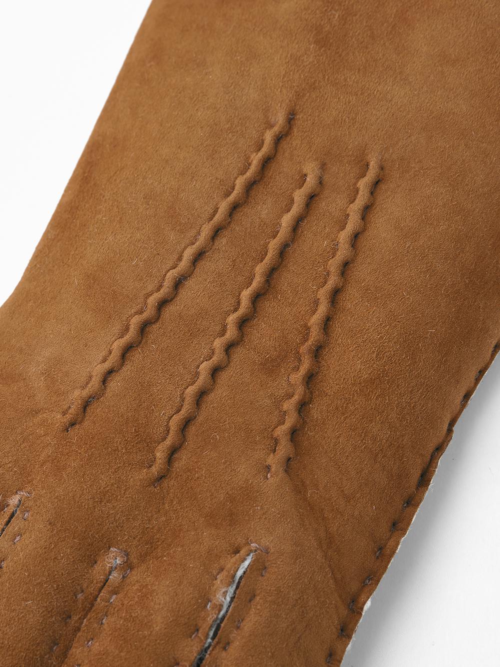 Light brownish-yellow hand-sewn fur suede glove
(4 of 4)