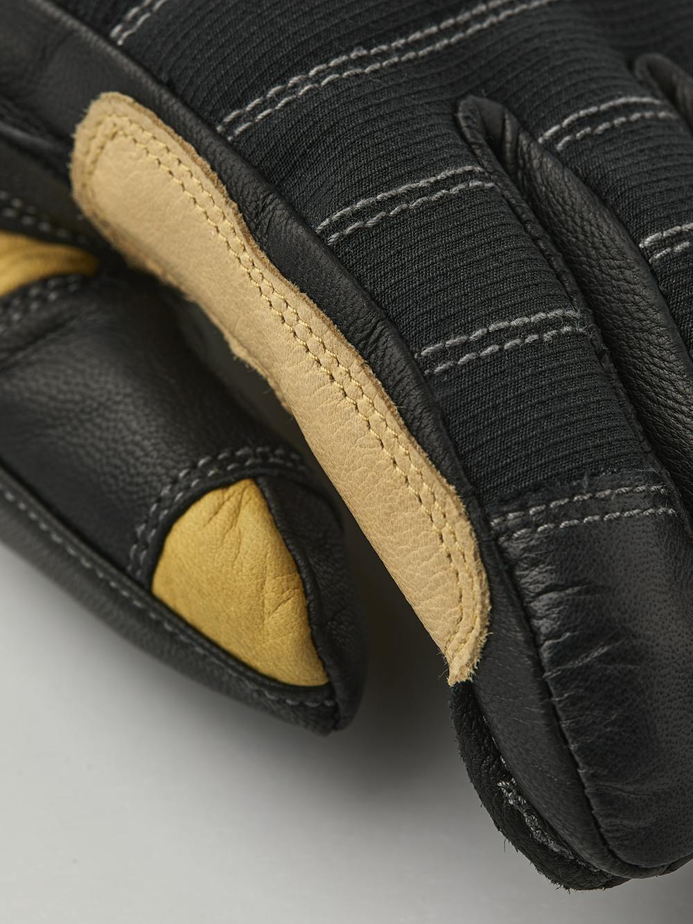 Black goat leather glove with yellow leather sections and neoprene cuff
(4 of 6)