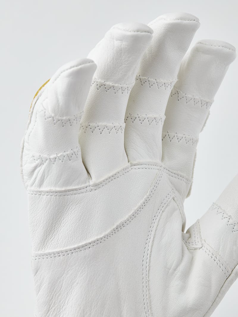 White goat leather ski glove with yellow backhand protection and adjustable opening
 (5 of 5)