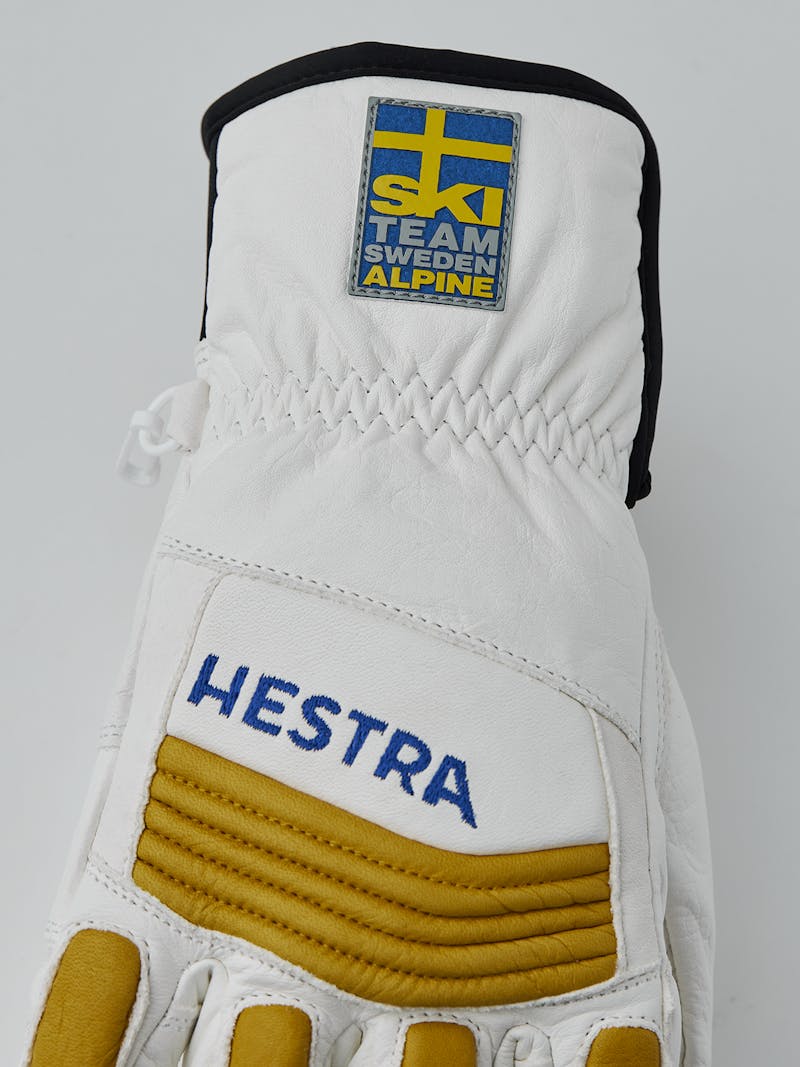 White goat leather ski glove with yellow backhand protection and adjustable opening
 (4 of 5)