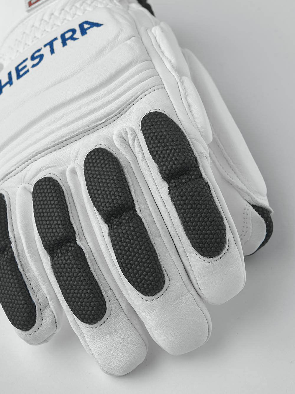 Weißer Skihandschuh aus Ziegenleder mit grauen Protektoren auf der Oberseite 
 (3 oder 6)