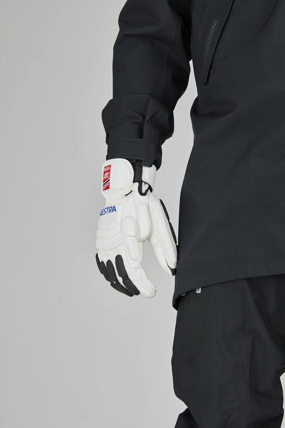 Weißer Skihandschuh aus Ziegenleder mit grauen Protektoren auf der Oberseite
(5 oder 6)