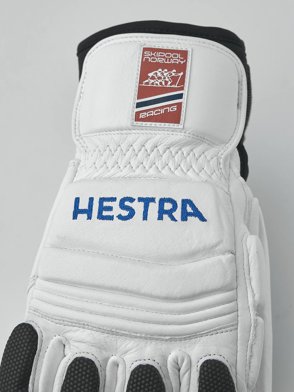 Weißer Skihandschuh aus Ziegenleder mit grauen Protektoren auf der Oberseite 
 (4 oder 6)