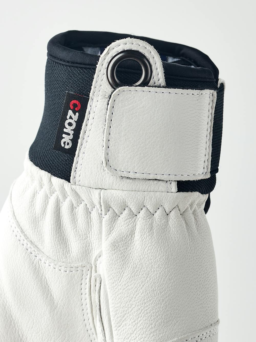 White goat leather ski glove with dark blue fabric back with shock-absorbing panels
(5 of 6)