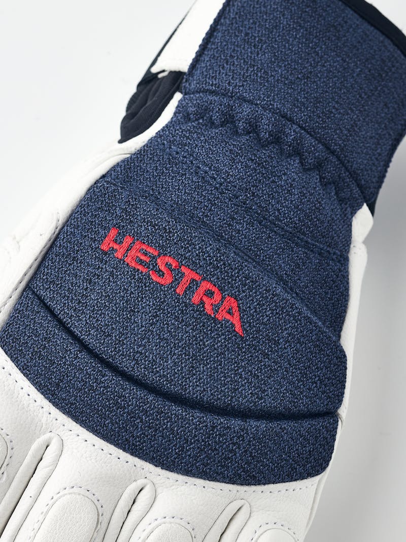 White goat leather ski glove with dark blue fabric back with shock-absorbing panels
 (4 of 6)
