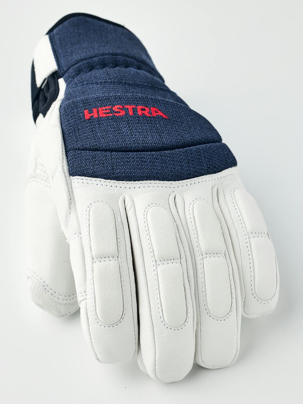 White goat leather ski glove with dark blue fabric back with shock-absorbing panels
(3 of 6)