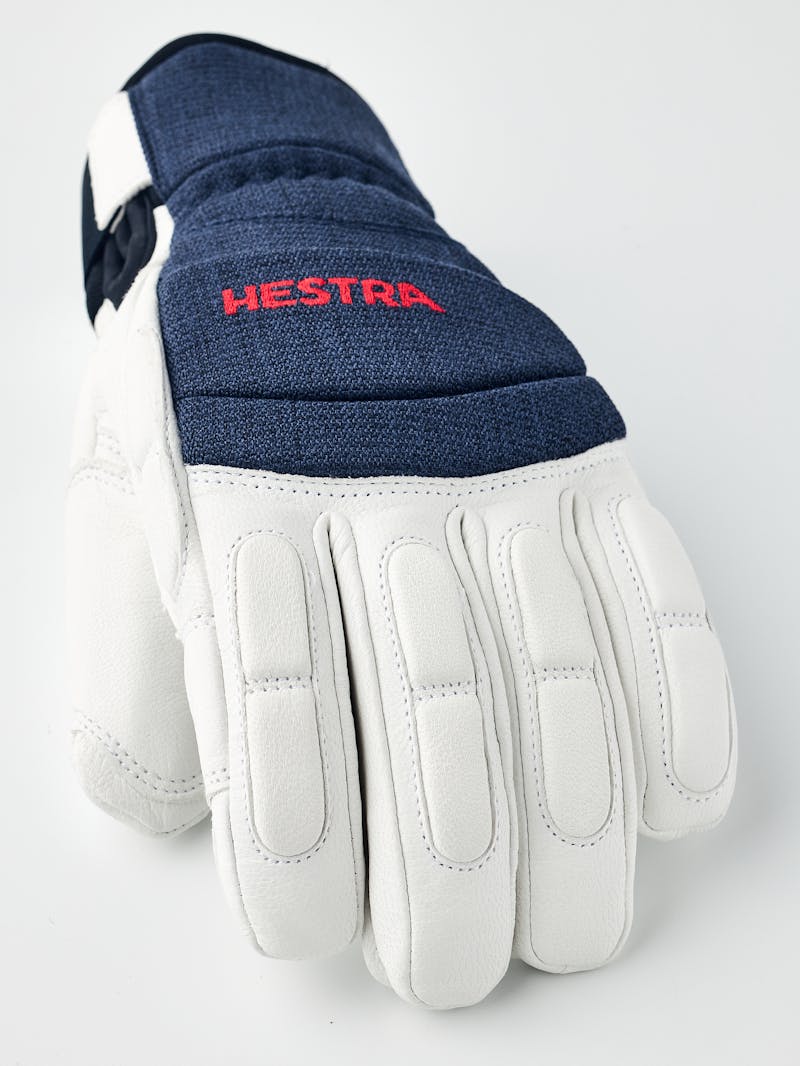 White goat leather ski glove with dark blue fabric back with shock-absorbing panels
 (3 of 6)