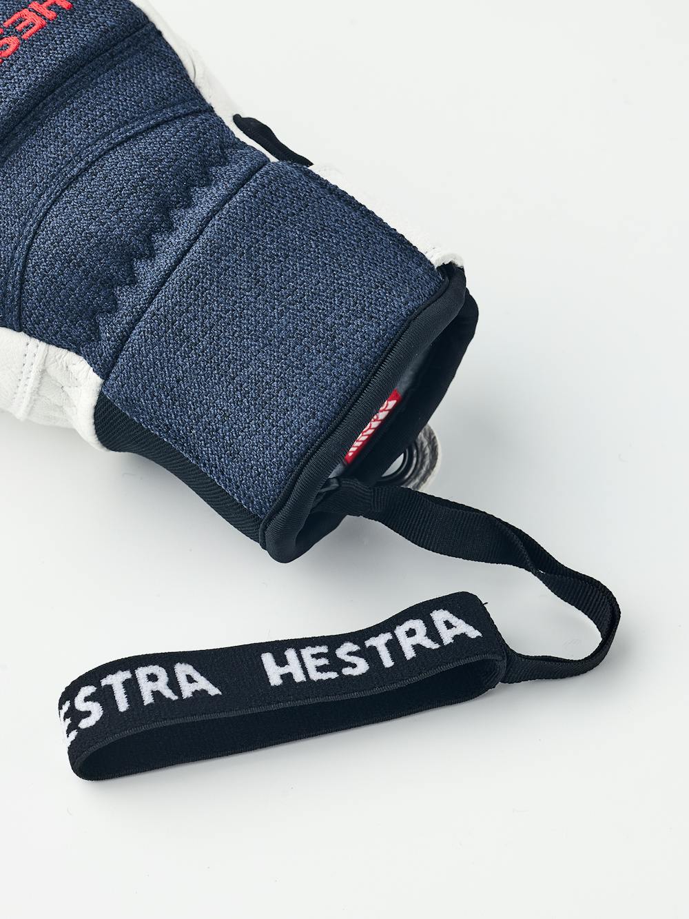 White goat leather ski glove with dark blue fabric back with shock-absorbing panels
(6 of 6)