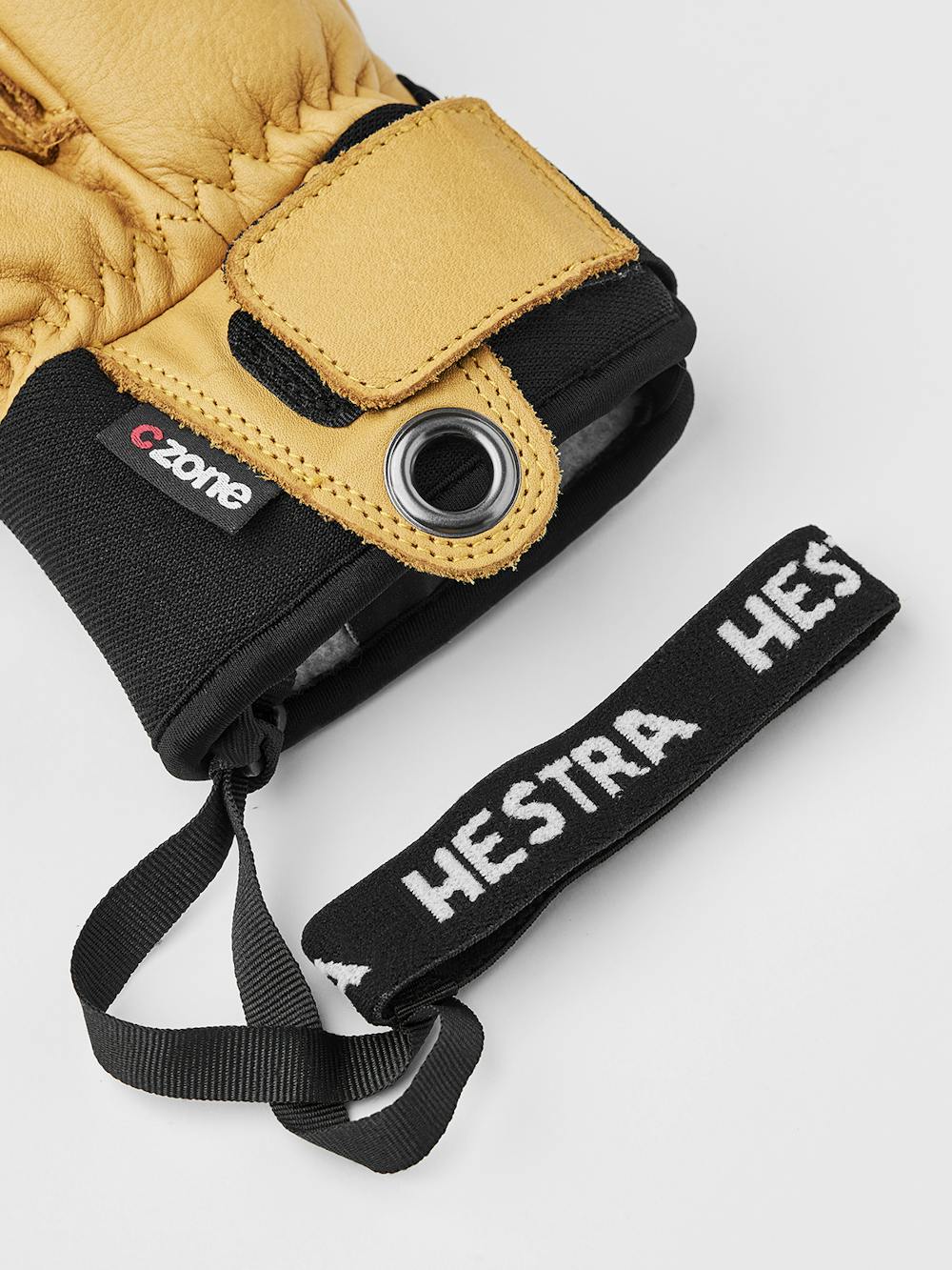 Light brown three finger goat leather ski glove with green fabric back with shock-absorbing panels
 (5 of 6)