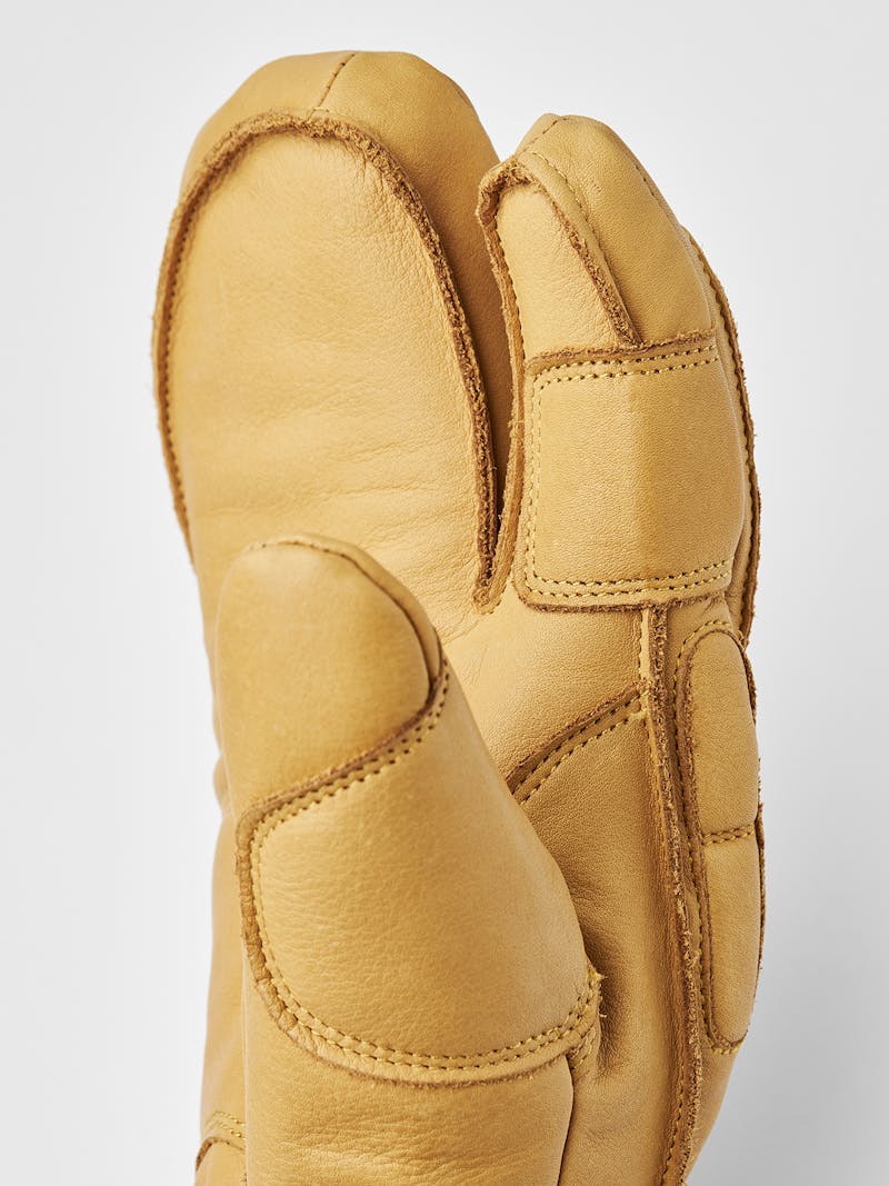 Light brown three finger goat leather ski glove with green fabric back with shock-absorbing panels
 (3 of 6)