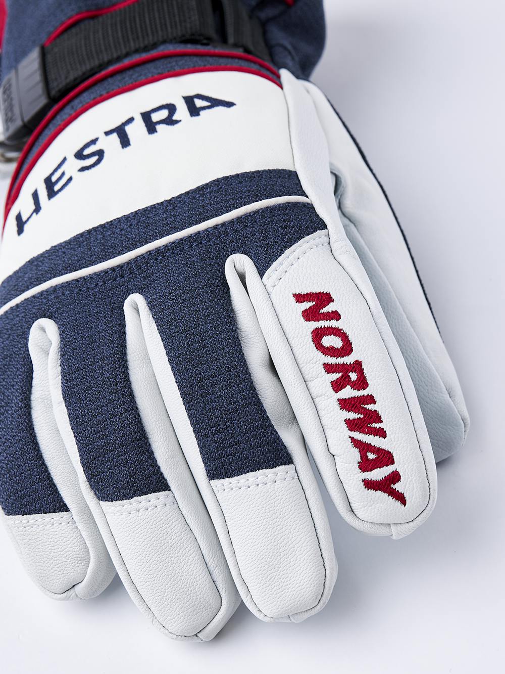 Blau-weißer Handschuh aus Ziegenleder und Stoff
(5 oder 6)