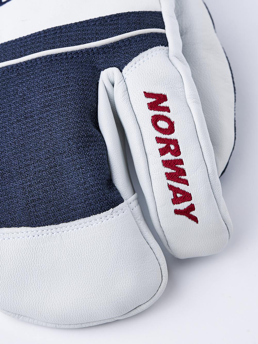 Blue white goat leather and fabric three finger glove
(5 of 6)