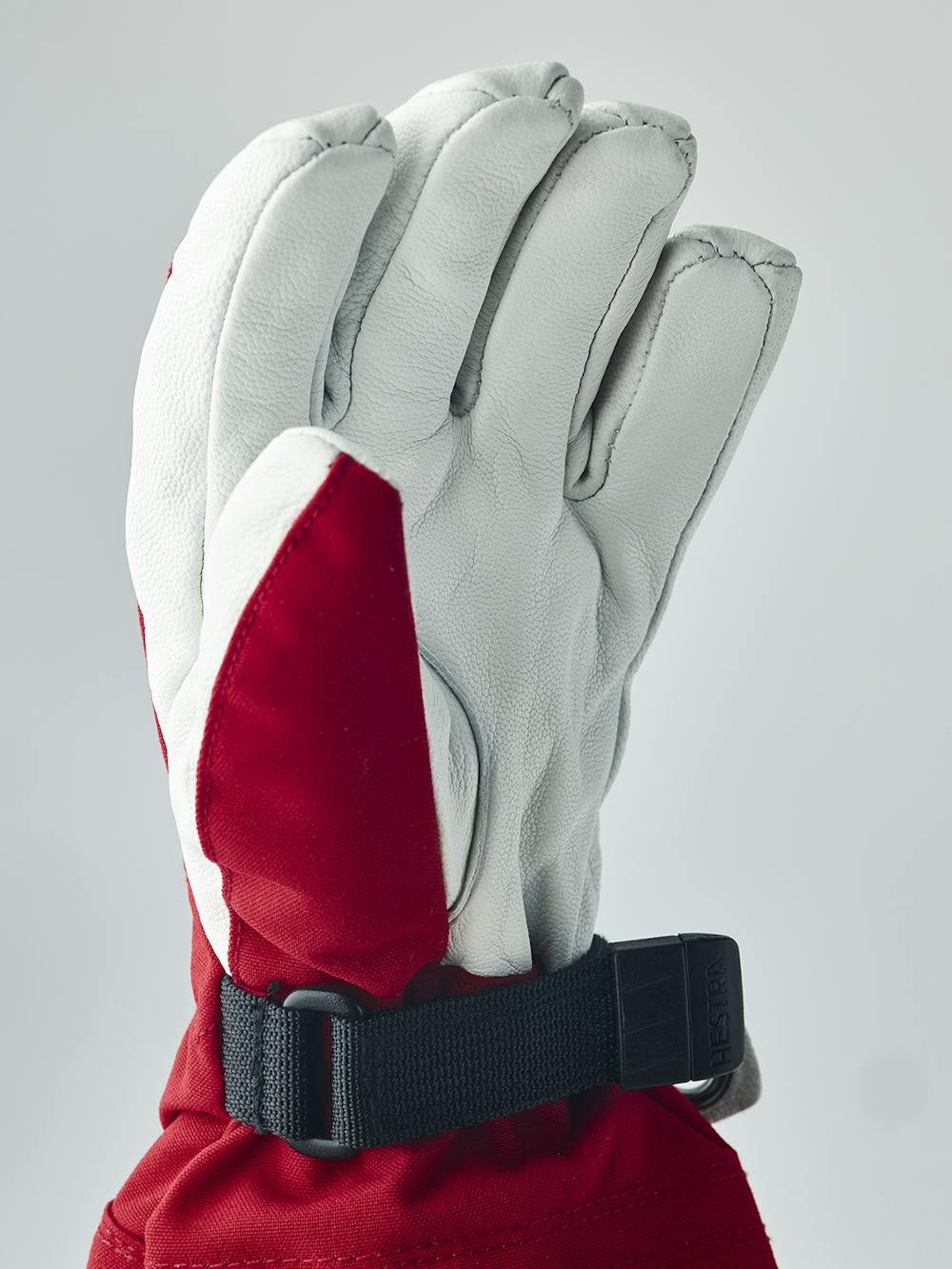 Red ski glove with white goat leather palm
 (2 of 7)