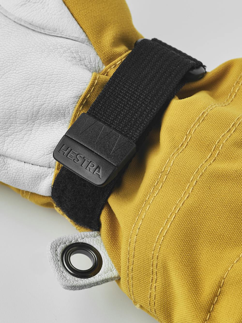 Gelber Skihandschuh mit weißem Ziegenleder an der Innenhand
(5 oder 9)