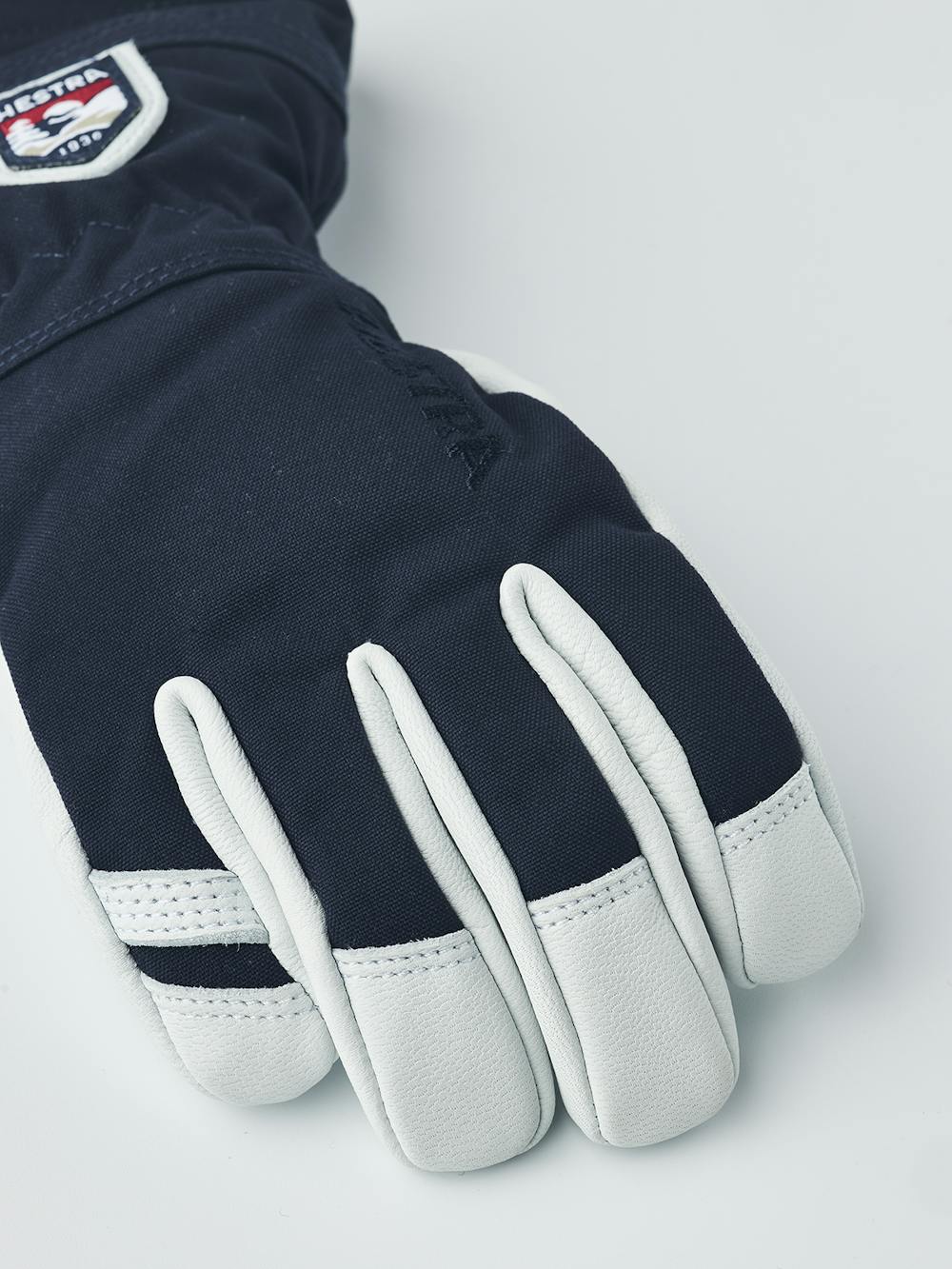 Dark blue ski glove with white goat leather palm
 (2 of 6)