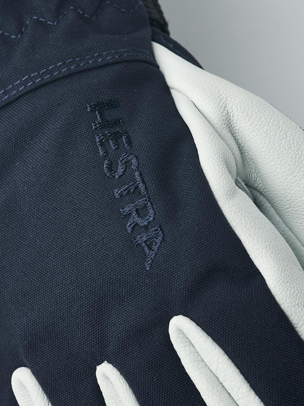 Dark blue ski glove with white goat leather palm
(6 of 6)